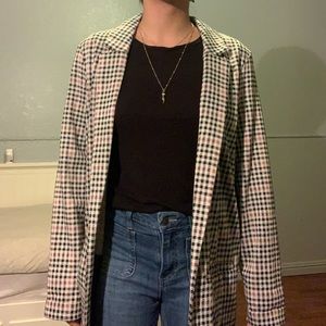 Houndstooth patterned pink white and black blazer